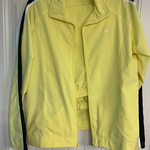 Nike 2 pc track suit. Yellow and navy XL jacket and pants. Pants are crop length